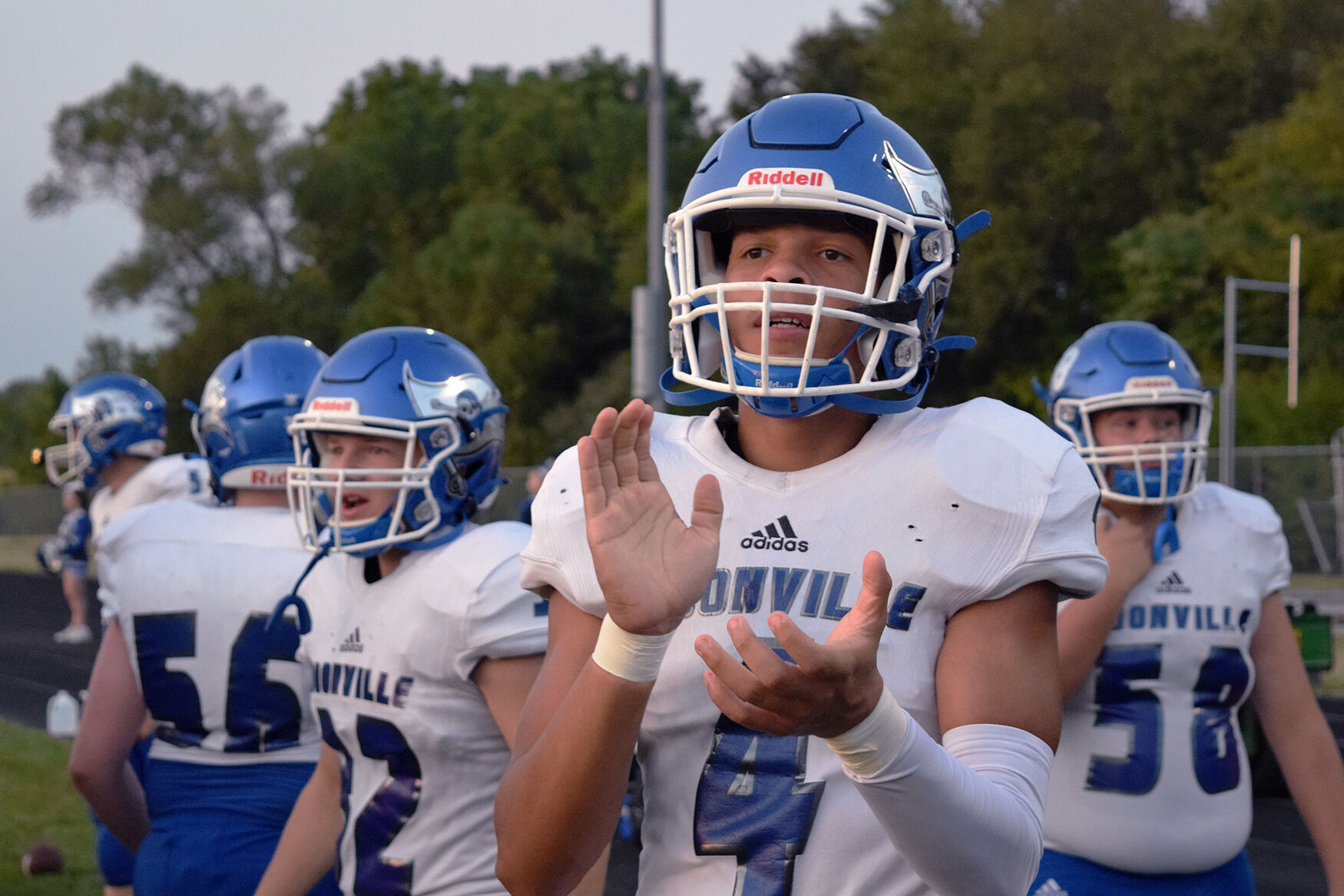 Langston Hall celebrates from the sideline